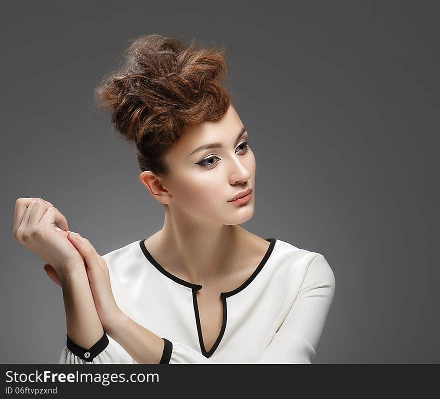 Beauty Portrait. Beautiful girl in white dress