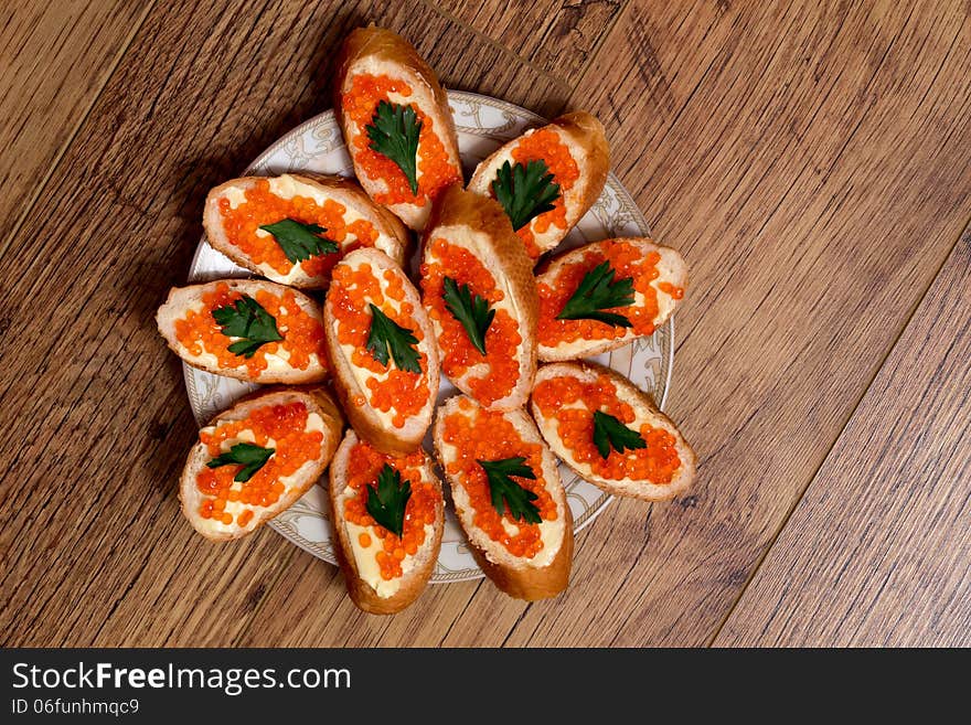 Plate With Tasty Sandwiches With Red Caviar