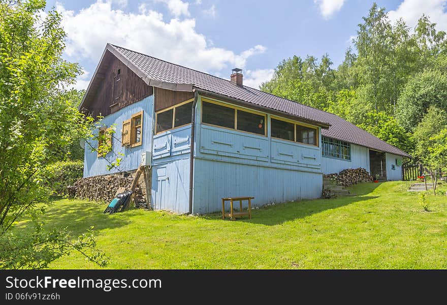 Country cottage in blue colour