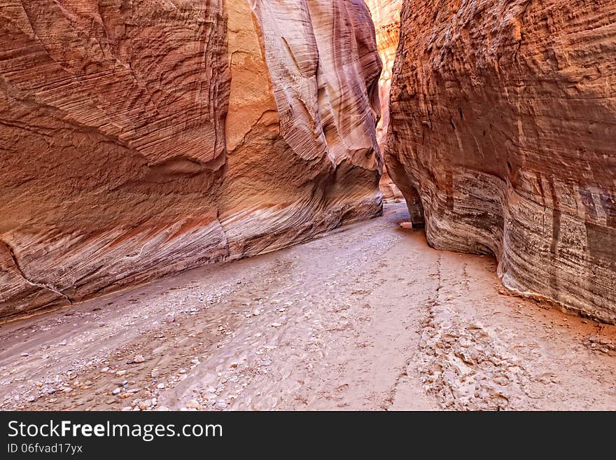 This is Buckskin Canyon, a highly scenic slot canyon, which meets with the Paria River at the confluence. This is Buckskin Canyon, a highly scenic slot canyon, which meets with the Paria River at the confluence.