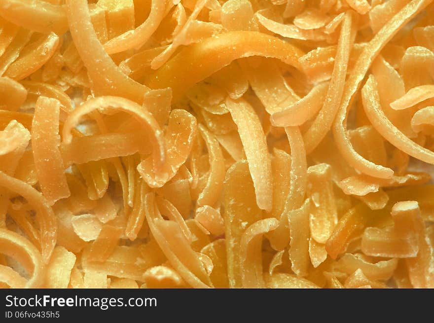 Closeup of orange soap scraps background. Closeup of orange soap scraps background