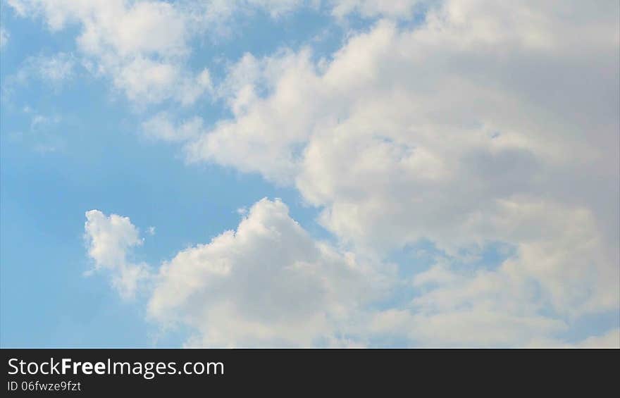 Clouds in blue sky timelapse