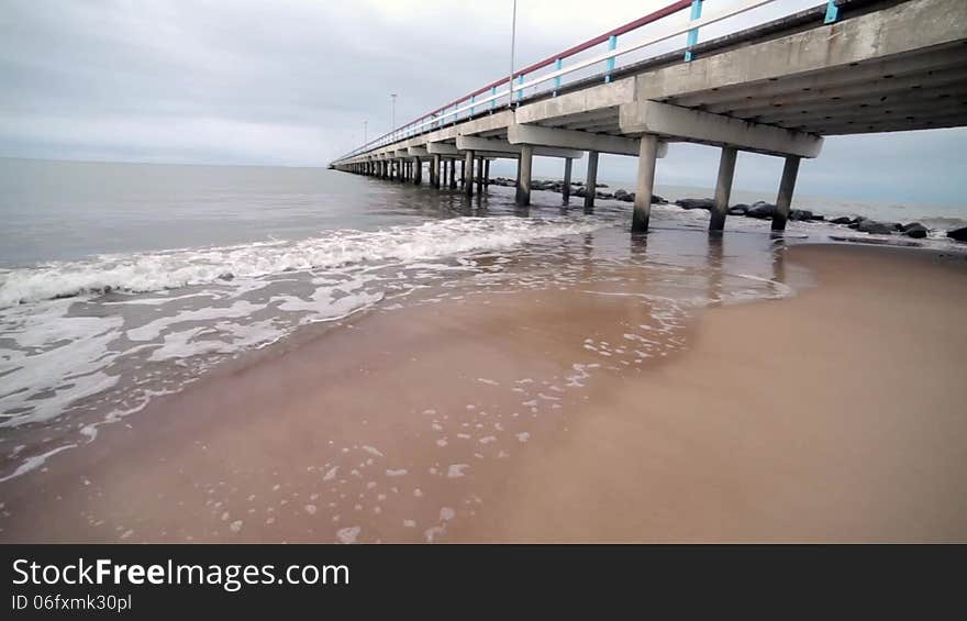 Waves, Sea And Pier.