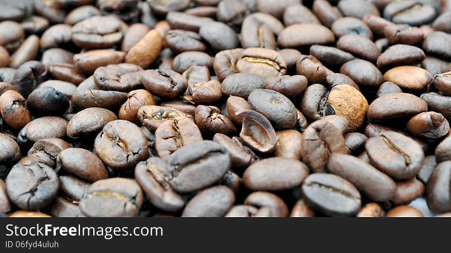 Coffee on grunge wooden background, coffee beans