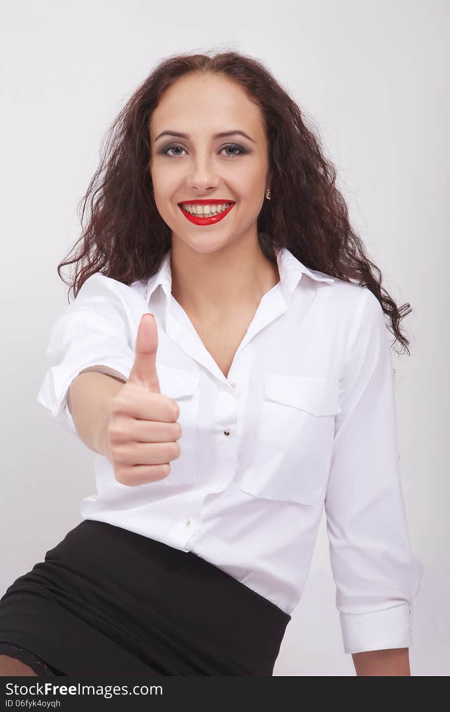 Woman showing thumb up