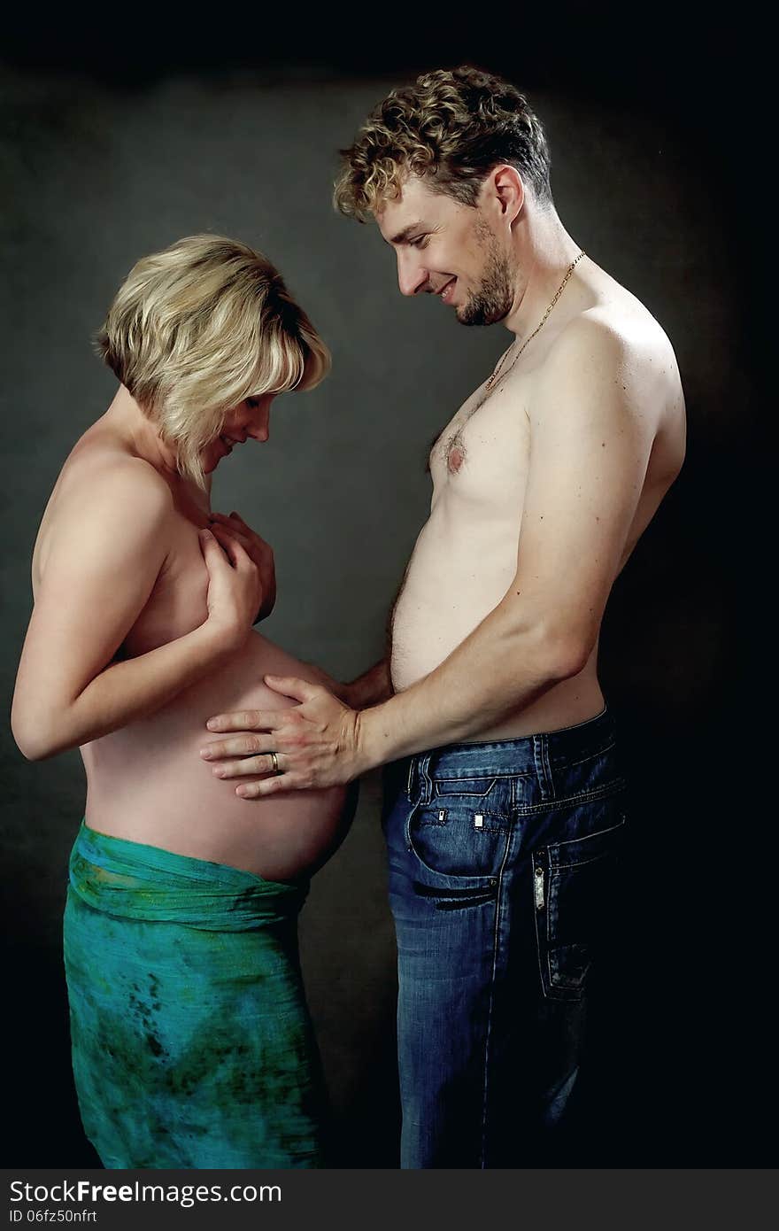 Loving happy couple, pregnant woman with husband