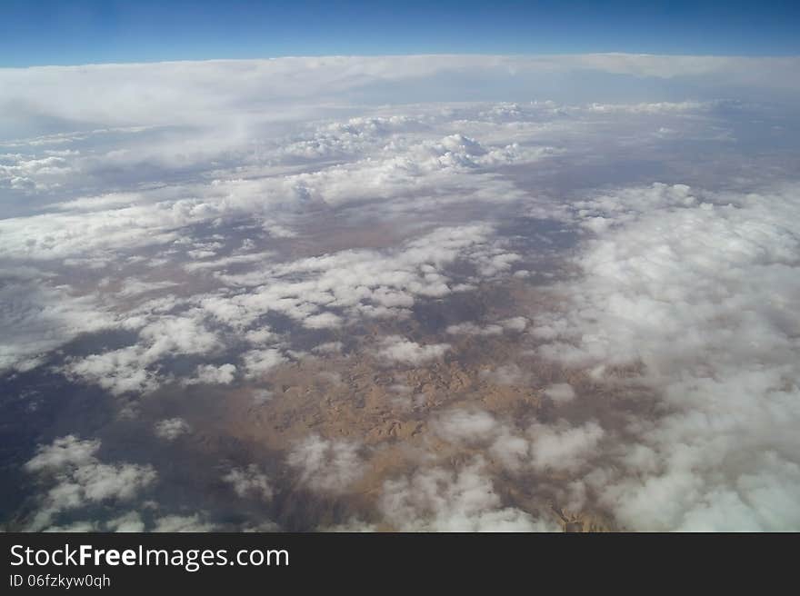 Sky view of cloudscape and earth. Sky view of cloudscape and earth