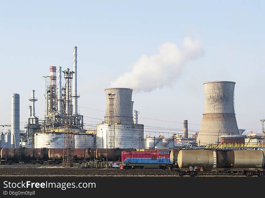 Oil tankers waiting to be loaded at an oil and gas refinery. Oil tankers waiting to be loaded at an oil and gas refinery