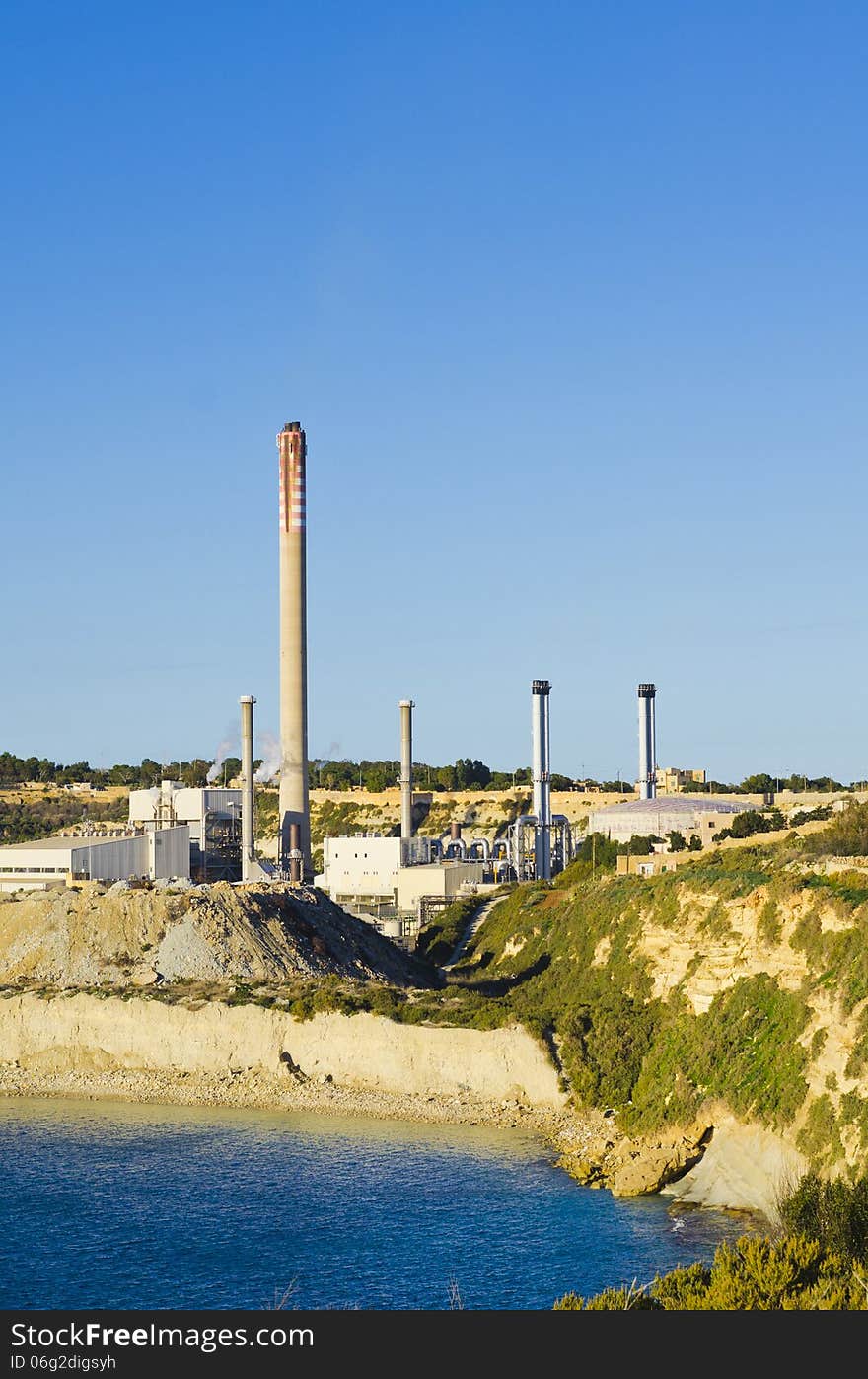 The Maltese power station and the controversial chimney built close to the fishing village of Marsaxlokk