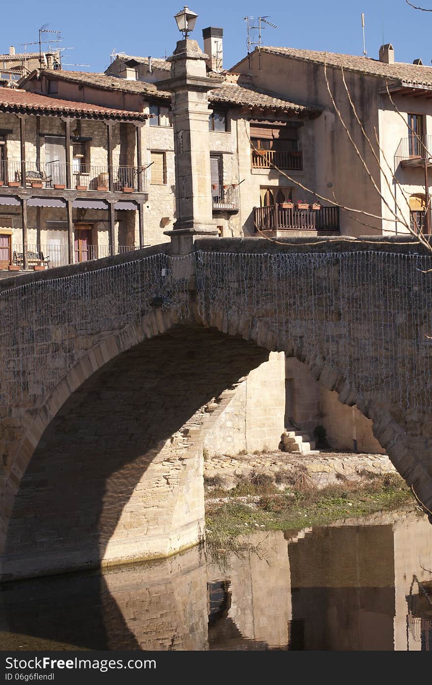 Stone bridge in the entrance to the medieval village of Valderrobres, Spain. Stone bridge in the entrance to the medieval village of Valderrobres, Spain