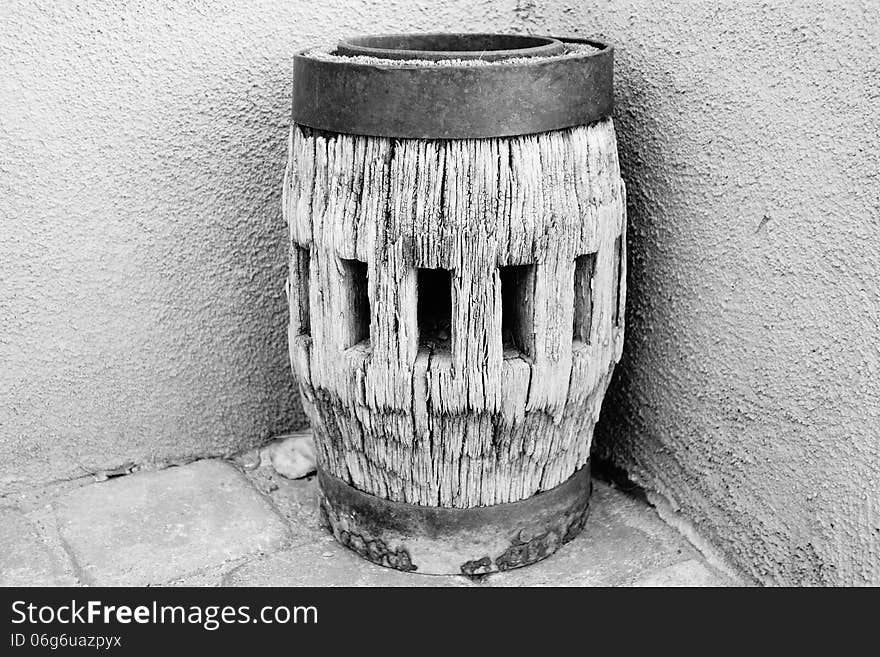 A picture of a wagon wheel hub sitting on a patio.