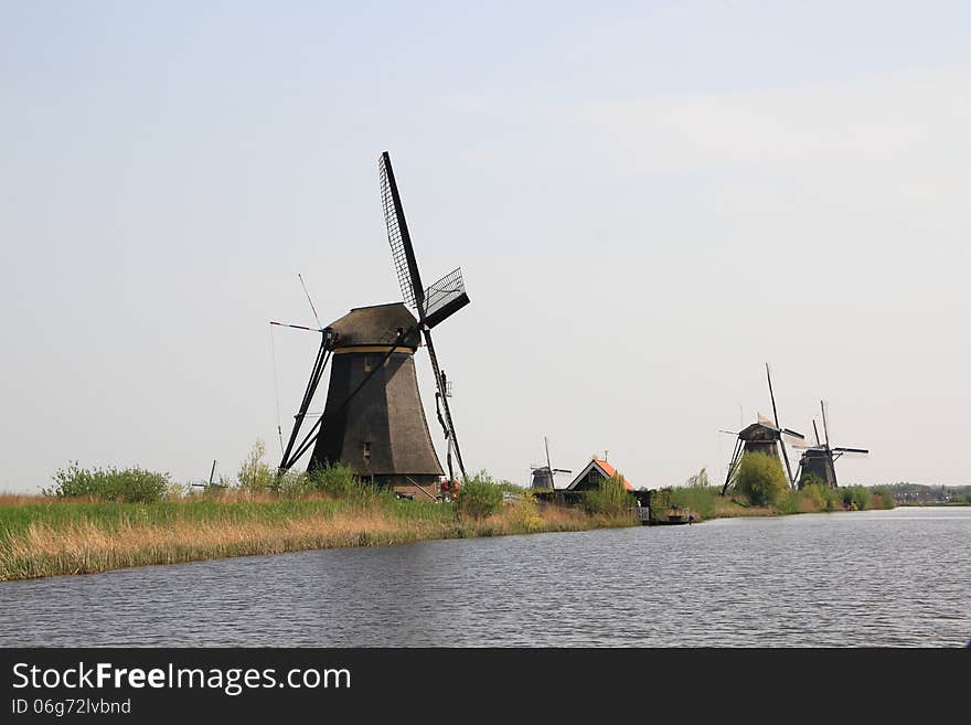 Windmills on the canal bank.