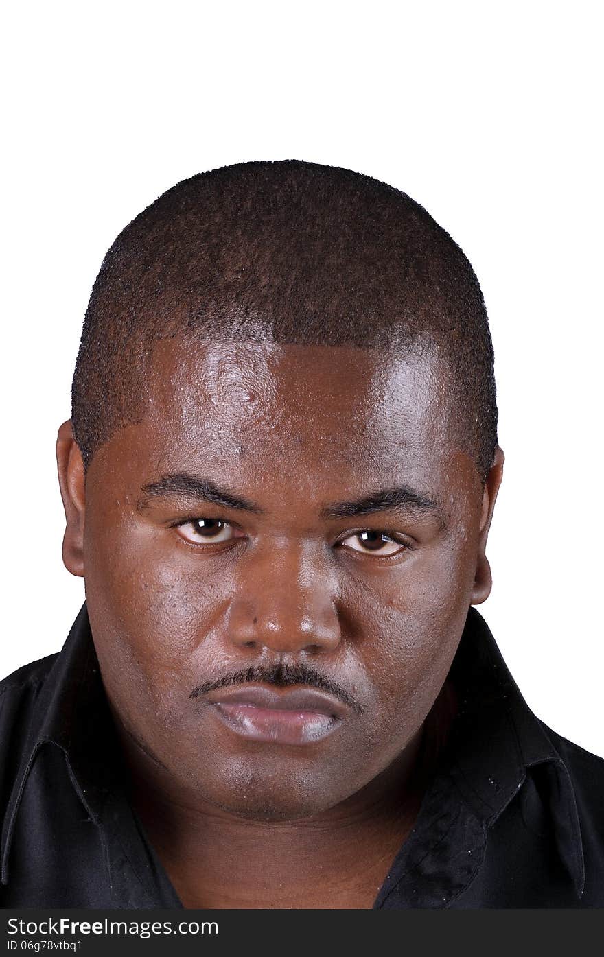 African American man in closeup over a white background. African American man in closeup over a white background