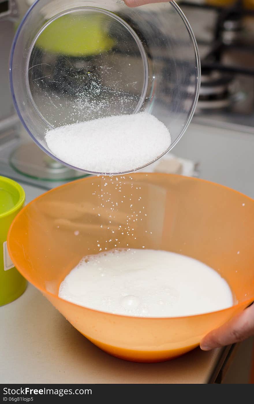 Adding white sugar to milk