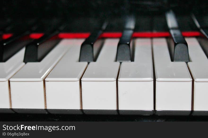 Black and white keys on a acoustic piano. Black and white keys on a acoustic piano