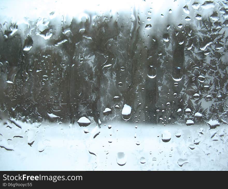 This is frosty pattern on glass winter window. This is frosty pattern on glass winter window