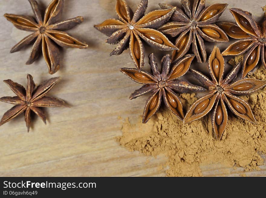 Anise and cinnamon on a wooden table