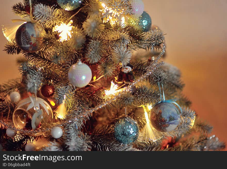 Colorful bright and beautiful Christmas tree decorated with toys on the new year. Colorful bright and beautiful Christmas tree decorated with toys on the new year