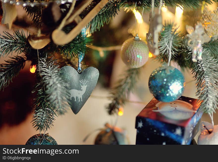 Colorful bright and beautiful Christmas tree decorated with toys on the new year. Colorful bright and beautiful Christmas tree decorated with toys on the new year