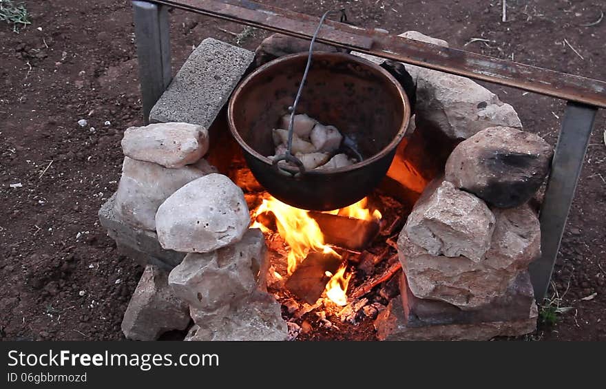 Cooking in the pot on the fire. Cooking in the pot on the fire