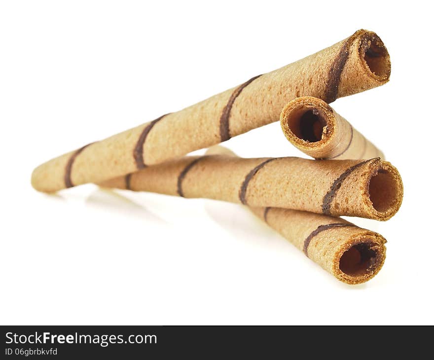 Close up of wafer stick pile on white background. Close up of wafer stick pile on white background