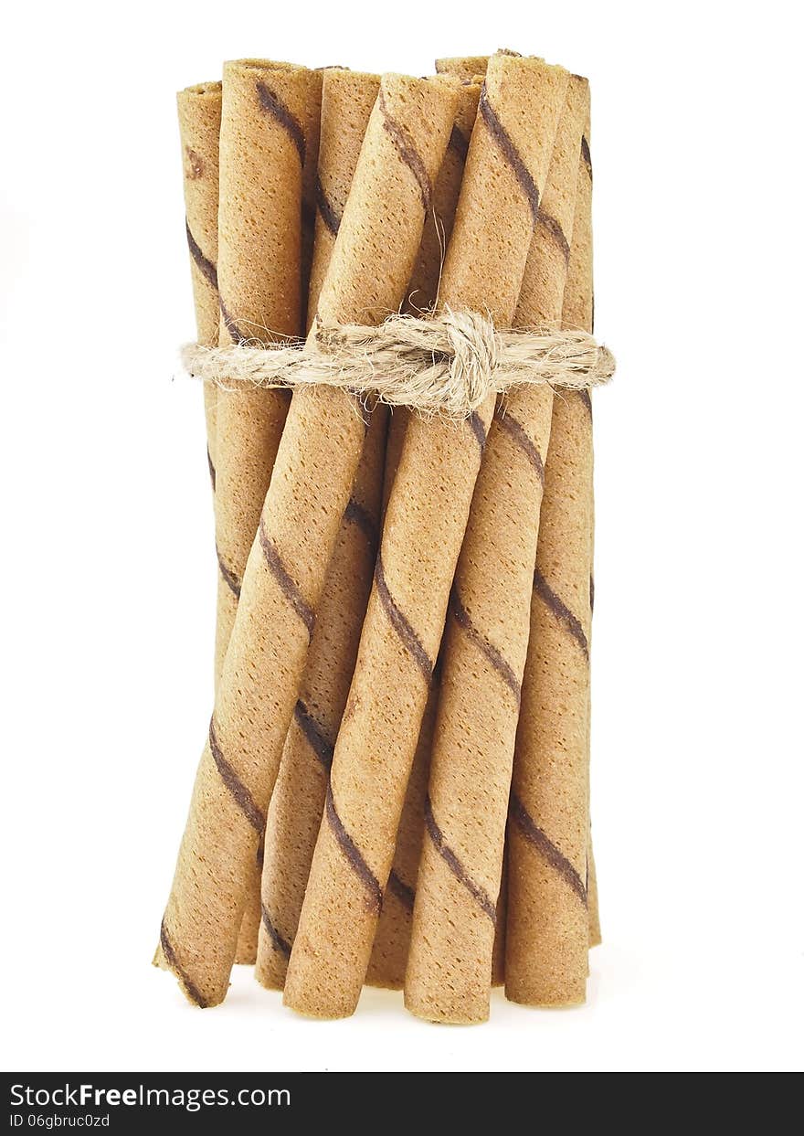 Binding of wafer stick group by hemp rope on white background. Binding of wafer stick group by hemp rope on white background