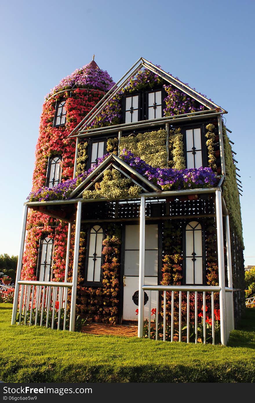 House covered with flowers on display at Miracle garden in Dubai. House covered with flowers on display at Miracle garden in Dubai