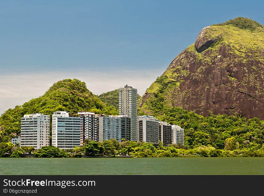 Residential Buildings and Mountains around Rodrigo de Freitas Lake in Rio de Janeiro, Brazil. Residential Buildings and Mountains around Rodrigo de Freitas Lake in Rio de Janeiro, Brazil