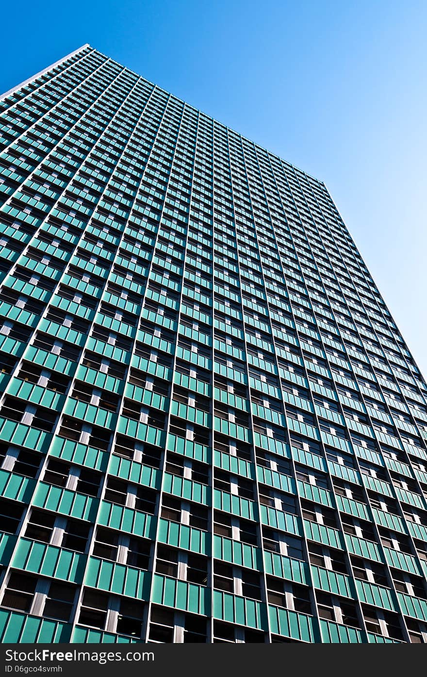 Facade of a Tall Modern Corporate Building in City Downtown. Facade of a Tall Modern Corporate Building in City Downtown