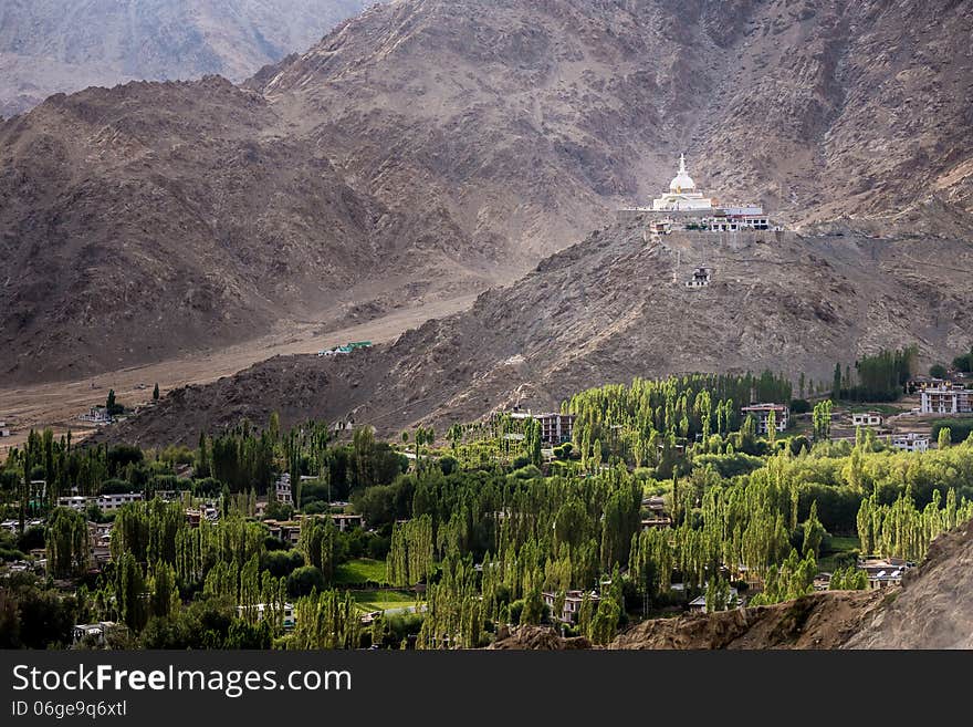 Shanti Stupa settle on rock mountain over city of Leh