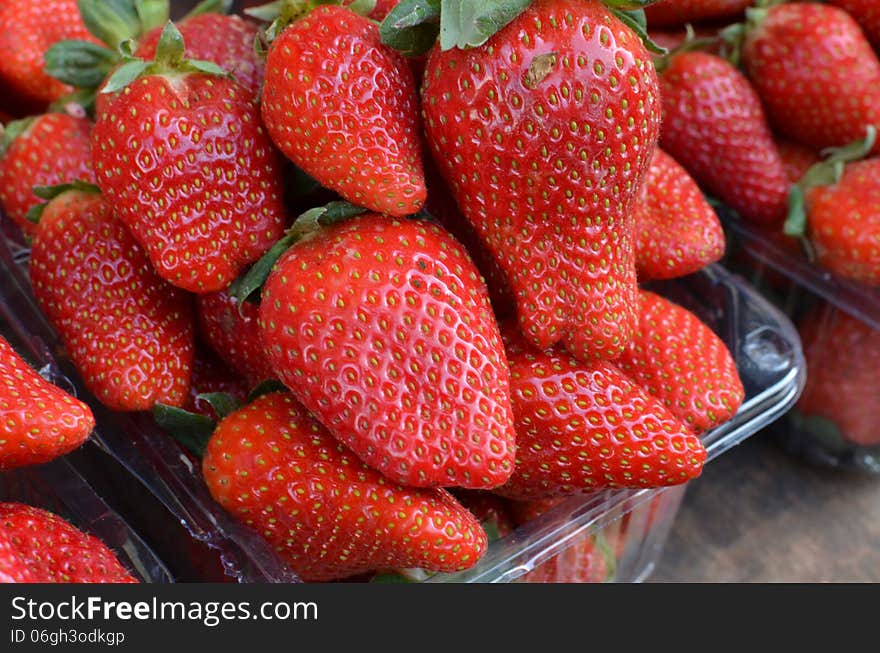 Market tand with fresh strawberries