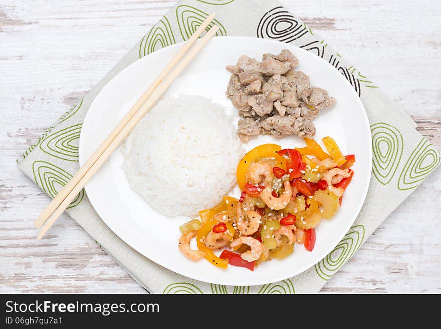 Chinese food-rice, chicken and vegetables with shrimp, top view