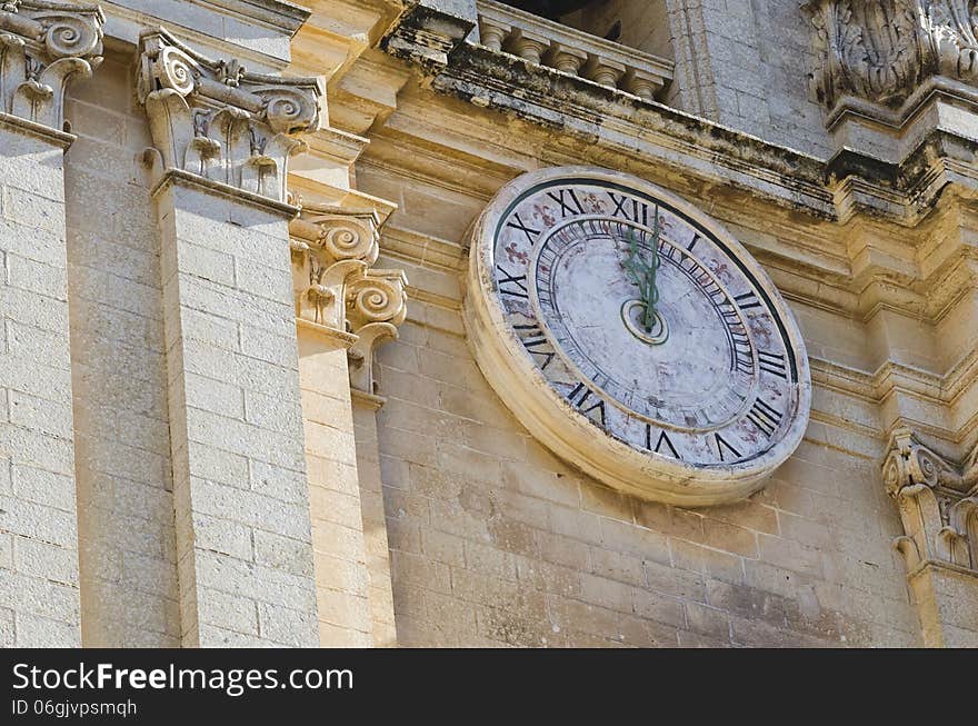 Large Clock on the facade of a Cathedral