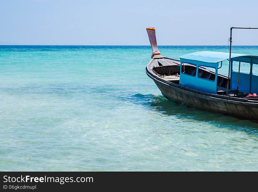 Blue boat on the beach