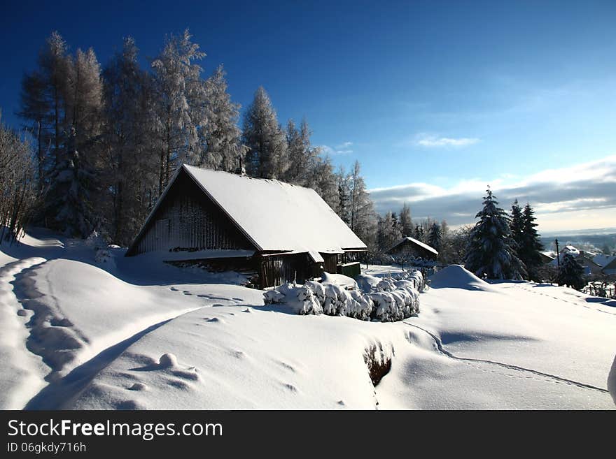 Cottage in snowy landscape, czech countryside cottage. Cottage in snowy landscape, czech countryside cottage