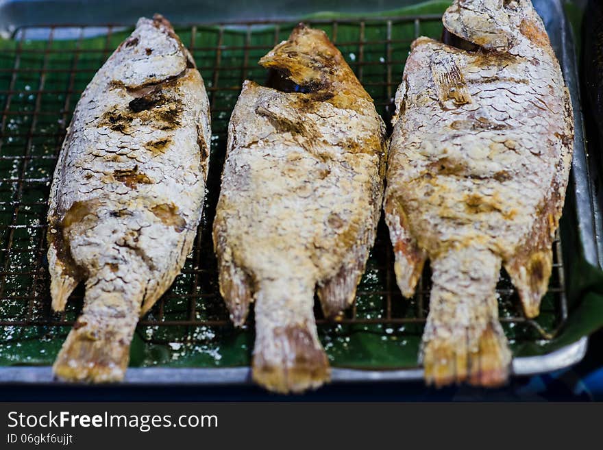 Fish in flour. Barbecue in Thailand. Shallow depth of field