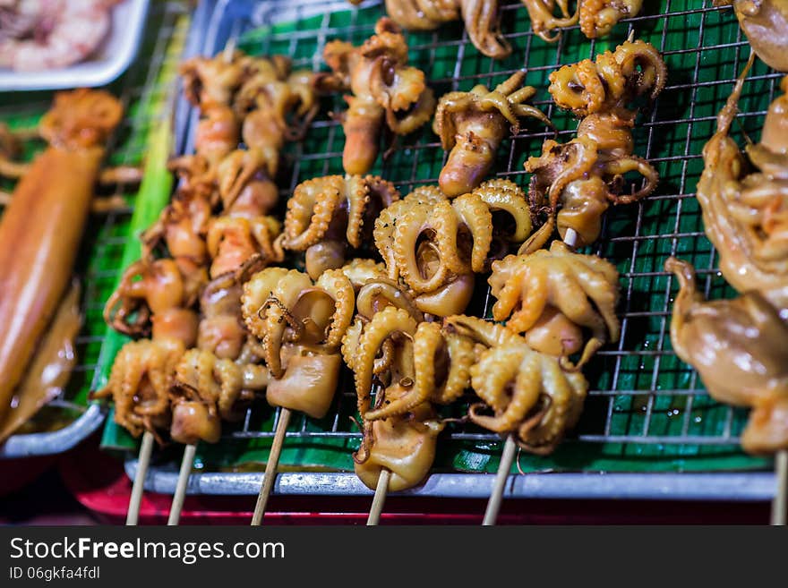 Cuttlefish octopus on the barbecue. Shallow depth of field