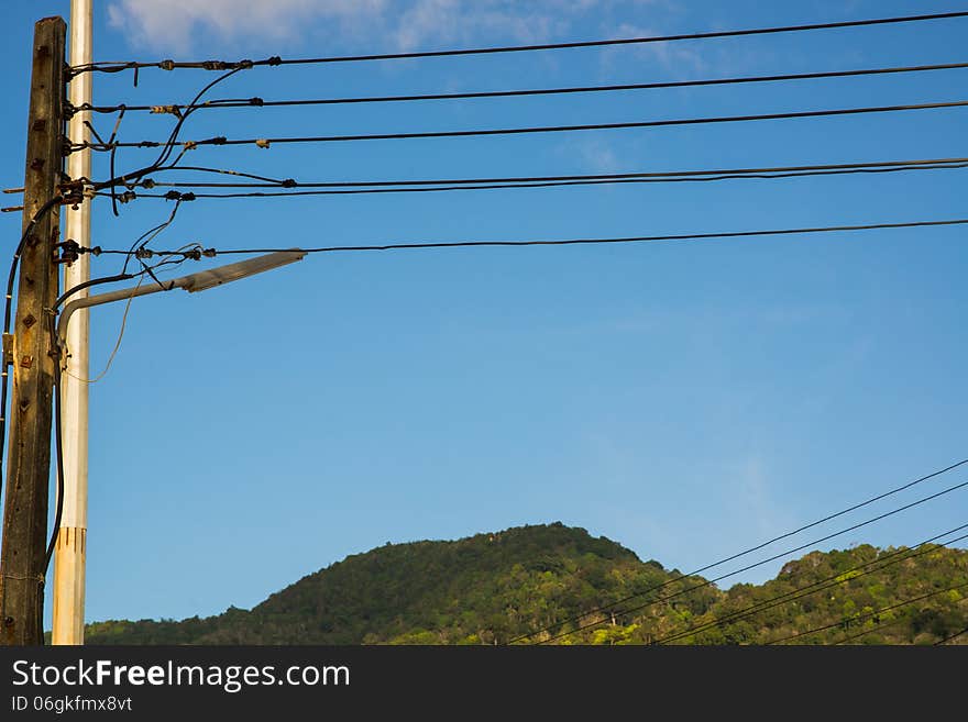 Power transmission pole on the background of a mountain landscap