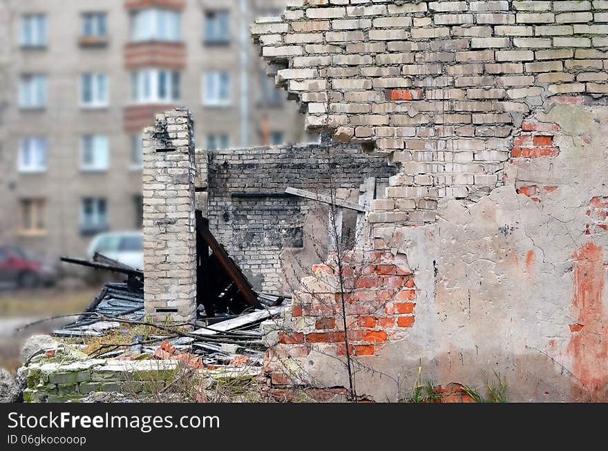 Fragment of the destroyed wall of the scorched building