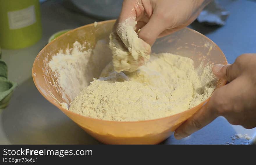 Man hand kneading cinnamon bread dough. Man hand kneading cinnamon bread dough