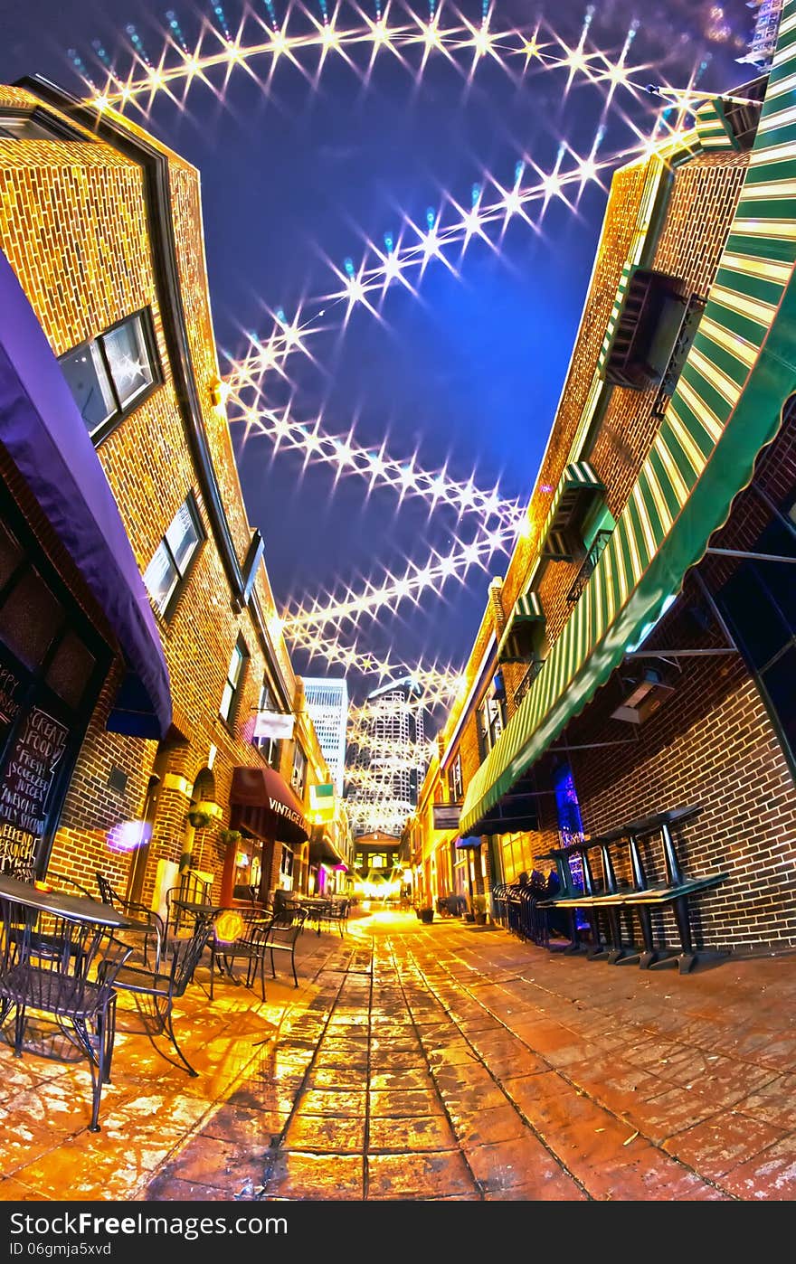 Charlotte, nc - january 1st, 2014: Night view of a narrow alley street with restaurants in charlotte, nc