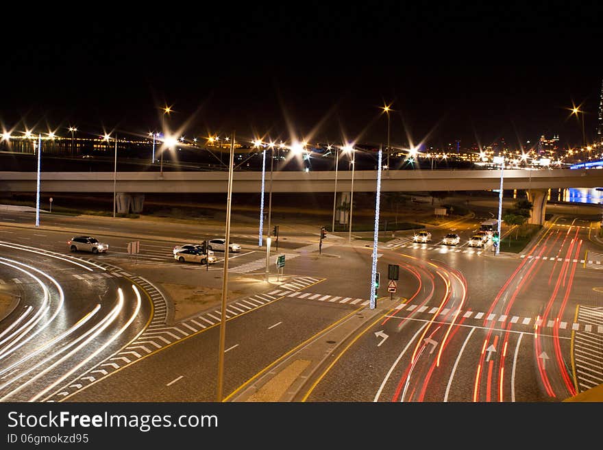 Vehicle movement at intersection during night. Vehicle movement at intersection during night.