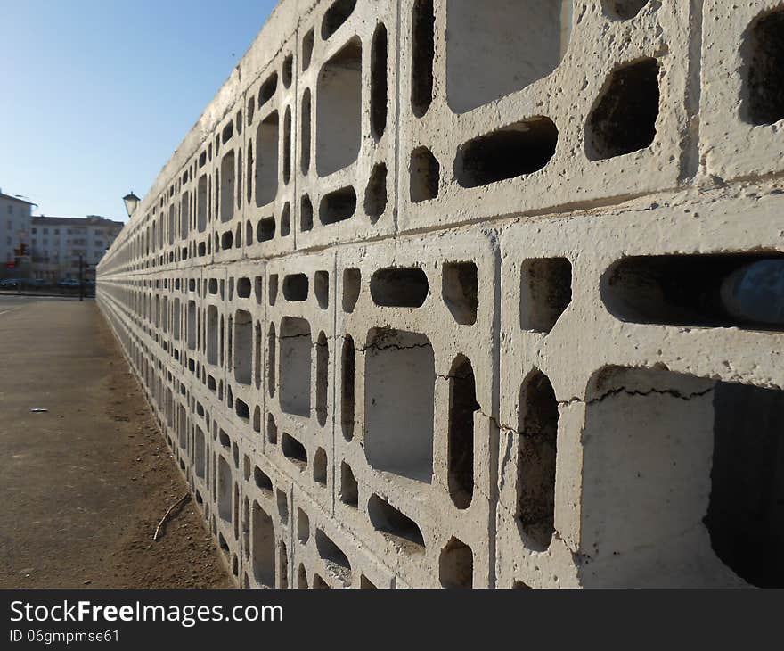 Fence of decorative concrete blocks. Fence of decorative concrete blocks