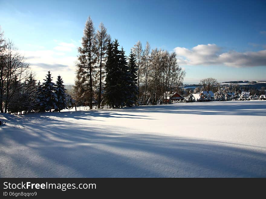 Scenic winter landscape with village