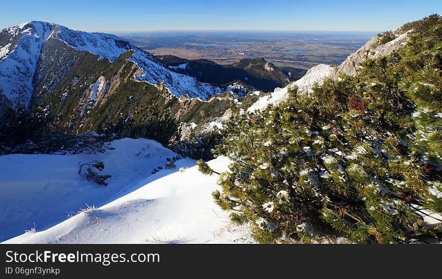 A view of Upper Bavaria from Mount Herzogstand in the Bavarian Alps, with Lake Staffel in the distance.