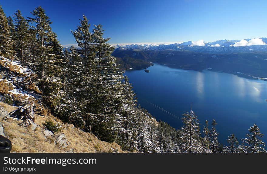 Lake Walchen as seen from Mount Herzogstand, Bavaria, with the Austrian Alps in the distance. Lake Walchen as seen from Mount Herzogstand, Bavaria, with the Austrian Alps in the distance.