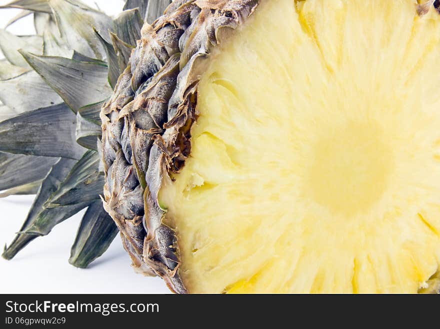 Pineapple cross section isolated on white background