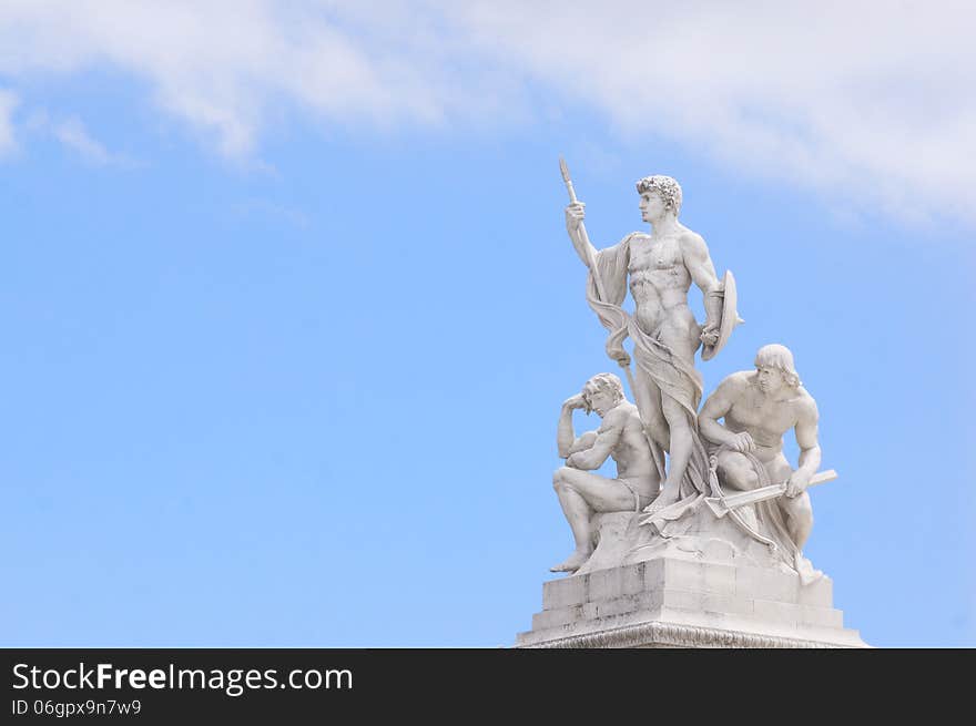 Three Men Statue At National Monument Of Victor Emmanuel II Rome Piazza Venezia