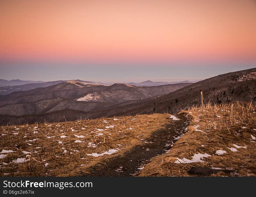 The Appalachian Trail at Roan Mountain in the winter during sunset. The Appalachian Trail at Roan Mountain in the winter during sunset