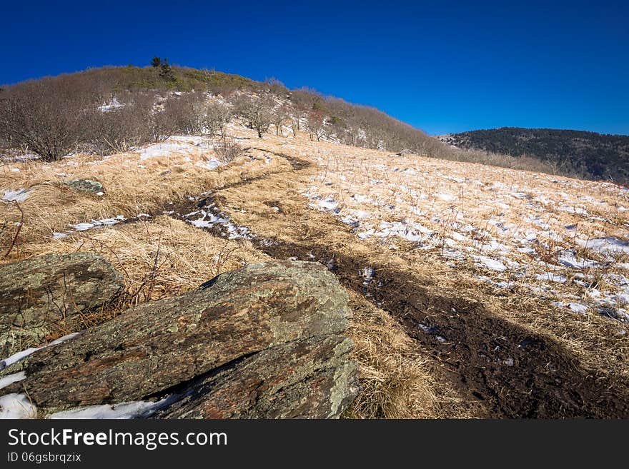 The Appalachian Trail at Roan Mountain in the winter during sunset. The Appalachian Trail at Roan Mountain in the winter during sunset